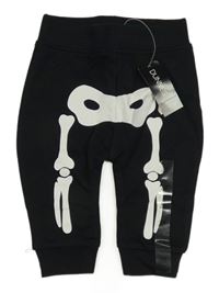 Nové - Čierne tepláky s kostlivcem Dunnes