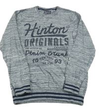 Tmavomodrý melírovaný sveter s nápisom C&A