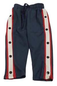 Tmavomodré tepláky s pruhy