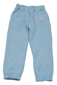 Světlemodré tepláky s nápisem 