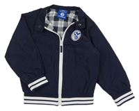 Tmavomodrá šušťáková jarná bunda s nášivkou