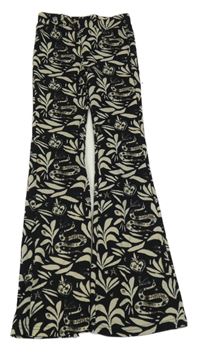 Čierno-svetlobéžové vzorované rebrované flare nohavice s hady a srdiečkami shoeby