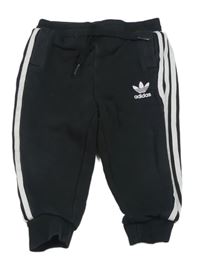 Čierne tepláky s logom Adidas