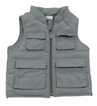 Šedá šusťáková zateplená vesta s kapsami F&F