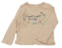 Růžové triko s květinami a nápisem Tu