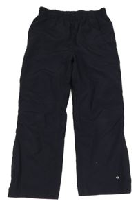 Tmavomodré šusťákové podšité kalhoty 