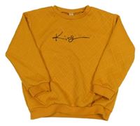 Okrová vzorovaná mikina s nápisom