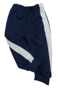 Tmavomodro-bílé sportovní kalhoty 