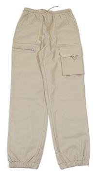 Béžové koženkové cargo cuff nohavice River Island