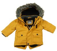 Hořčicová šusťáková zateplená bunda s kapucí s kožešinou Primark