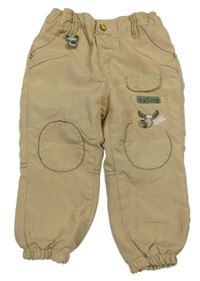 Béžové šušťákové podšité nohavice so sobom Ergee