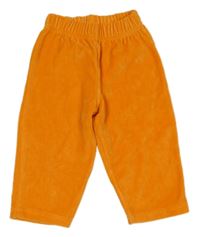 Oranžové zamatové nohavice