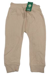 Nové - pudrové žebrované tepláky so cute