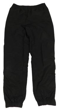 Čierne šušťákové športové nohavice Lacoste