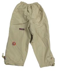 Béžové šušťákové zateplené nohavice