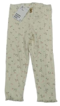 Nové - Smetanové legíny s kytičkami H&M