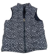 Tmavomodrá šušťáková prešívaná zateplená vesta s kvietkami