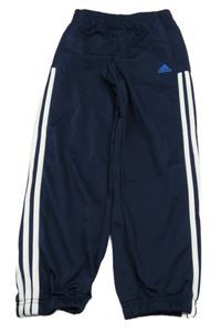 Tmavomodré sportovní tepláky s pruhy Adidas 