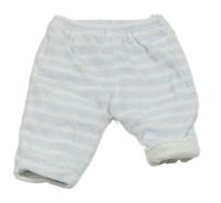 Světlemodro-biele pruhované zamatové zateplené tepláky C&A