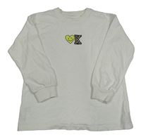 Biele tričko so smajlíkom a písmenem Next