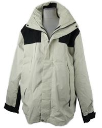 Pánska smetanovo-čierna šušťáková outdoorová jarná bunda