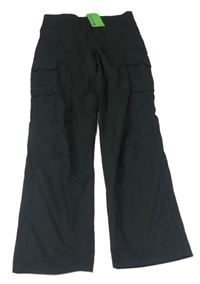 Čierne šušťákové outdoorové nohavice s vreckami Mountain Warehouse