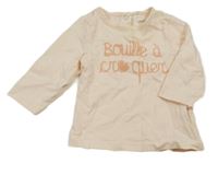 Broskvové triko s nápisem Orchestra