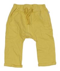 Žlté bavlnené baggy tepláky s vreckami