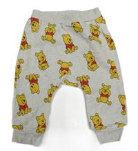 Béžové melírované tepláky s medvídkem Pú H&M