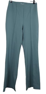 Dámske svetlomodré voľné é nohavice s pukmi NAKD