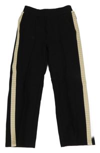 Čierno-béžové teplákové nohavice