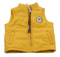 Žltá šušťáková zateplená vesta s medvedíkom C&A