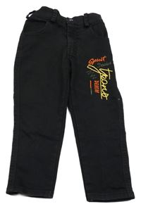 Čierne skinny rifle s nápisom