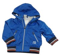 Tmavomodrá šusťáková jarní bunda s kapucí 