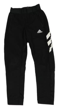 Čierne športové tepláky s logom Adidas