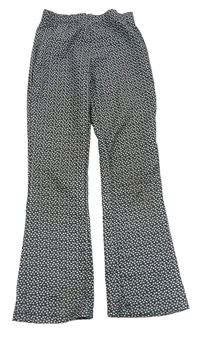 Čierne kvetované flare legíny Tu