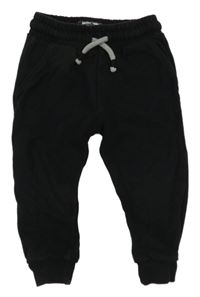 Černé tepláky zn.Next