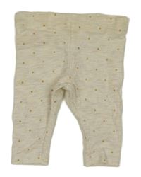 Béžové melírované legíny s puntíky