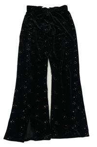 Čierne zamatové flare nohavice s hviezdičkami zn. M&S
