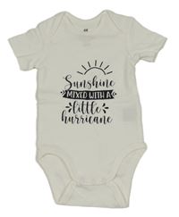 Bílé body s nápisy a sluníčkem H&M