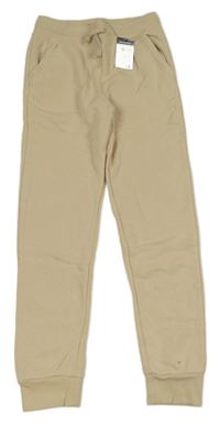 Nové - světlebéžové tepláky Primark