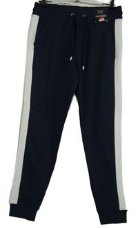 Nové - Pánske tmavomodro-biele slim jogger tepláky F&F