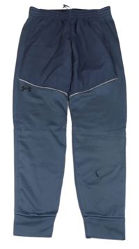 Tmavomodré šusťákovo/sportovní nohavice zn. Under Armour