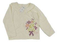 Nové - Smetanový svetr s kytičkami a volánkem Nutmeg