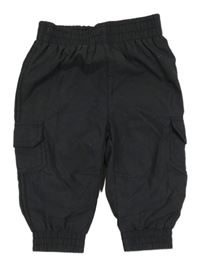 Čierne šušťákové podšité nohavice