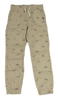 Béžové plátěné kalhoty s kostrami dinosaurů H&M