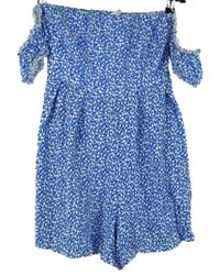 Dámský modro-bílý kytičkovaný žabičkový letní overal s volnými rameny FB Sister  