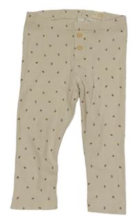 Béžové kytičkované legíny H&M