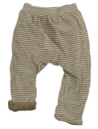 Béžovo-biele pruhované zamatové zateplené tepláky