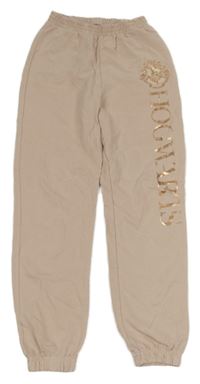 Světlerůžové tepláky - Harry Potter H&M